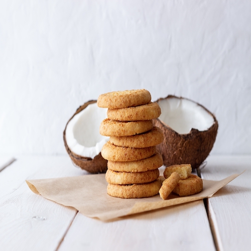 Coconut cookies on a white background. Coconuts